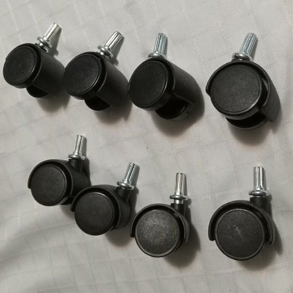 8 black plastic casters, new
